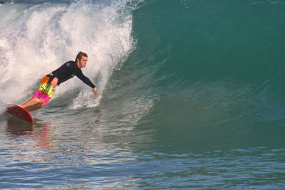 Man surfing in sea