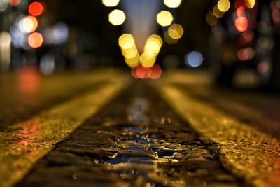 Close-up of yellow lights at night