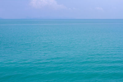 Scenic view of blue sea against sky