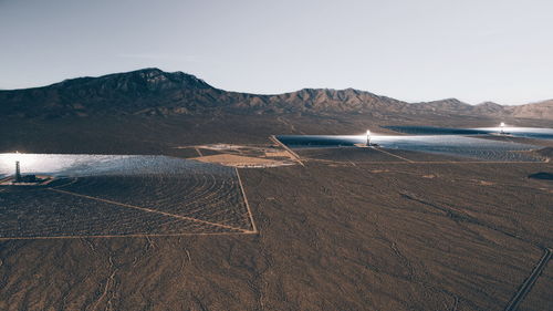 View of solar thermal power against mountain range