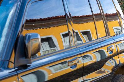 Close-up of yellow car