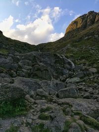 Scenic view of cliff against sky