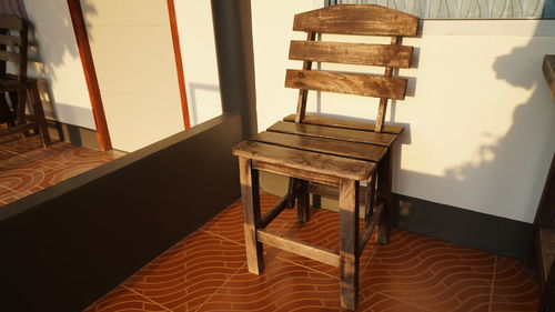 High angle view of chairs on table at home