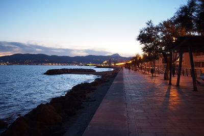 Illuminated street lights at night