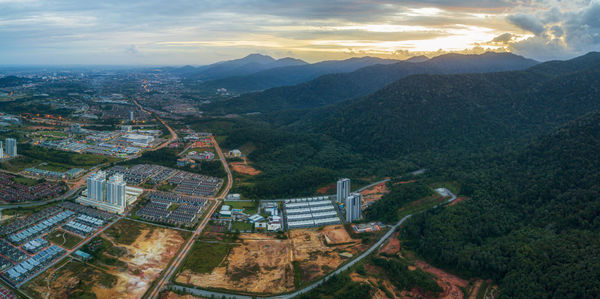 High angle view of buildings in city against sky