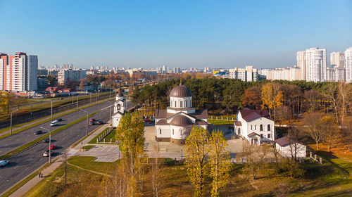 High angle view of buildings in city against clear sky