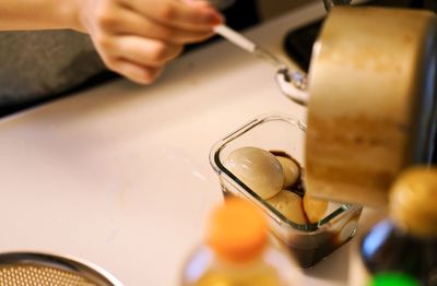 High angle view of person preparing food in kitchen