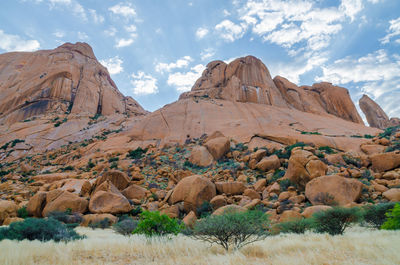 Rock formations in desert against sky