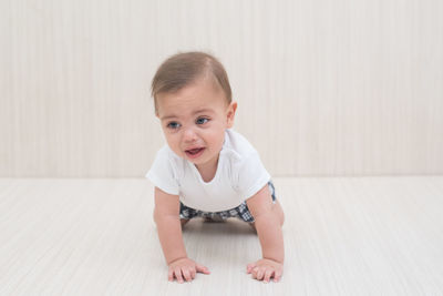 Portrait of cute smiling boy at home