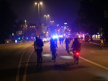 People on road at night