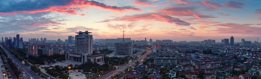 Aerial view of city at sunset