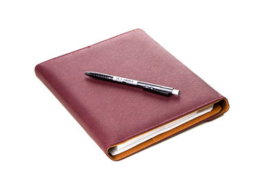 Low angle view of paper against white background