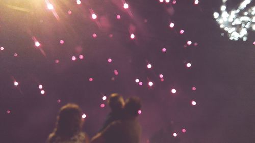 Blurred motion of people at night