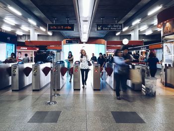 View of men standing in subway station