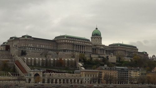 View of historical building against cloudy sky