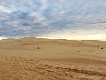 Scenic view of desert against sky