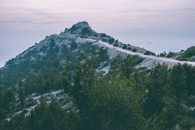 Scenic view of mountains against sky during winter