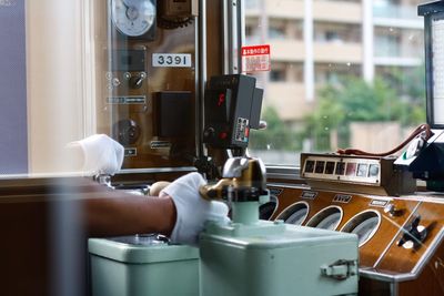 View of a cropped train operator