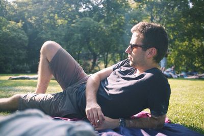 Young man relaxing in a park