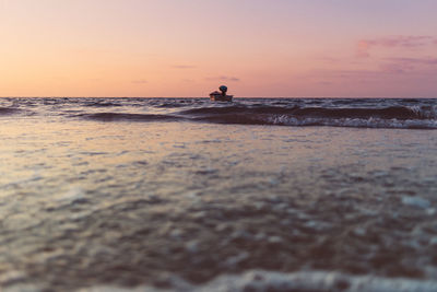 Tiny boat docking on the beach.