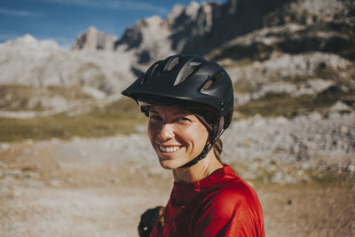 Portrait of smiling man riding bicycle