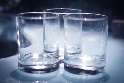 Close-up of empty drinking glass on table