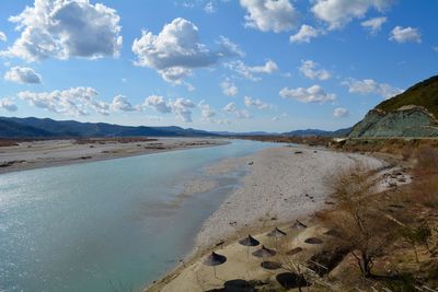 Scenic view of beach against sky