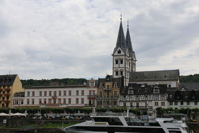 Low angle view of building against sky in city