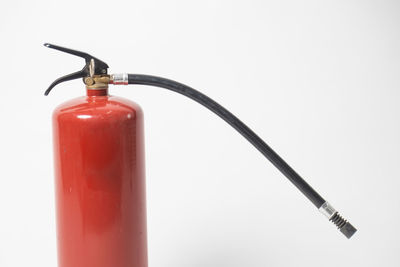 Close-up of bottle against white background