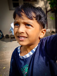 Close-up portrait of smiling boy