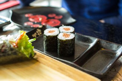 Close-up of sushi served on table