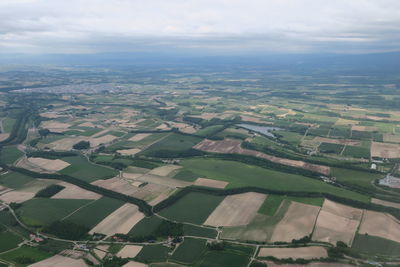 High angle view of agricultural field against sky