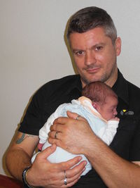 Father with daughter at home