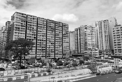 Buildings in city against sky