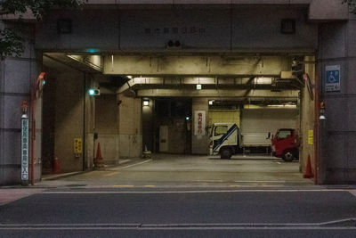 Empty parking lot in city at night