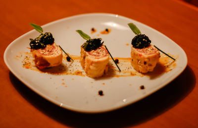 Close-up of sushi served in plate