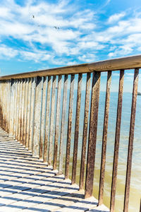 Steps on beach against sky