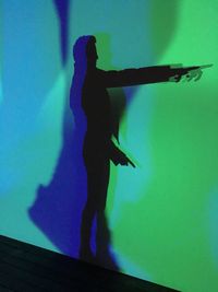 Shadow of people on wall