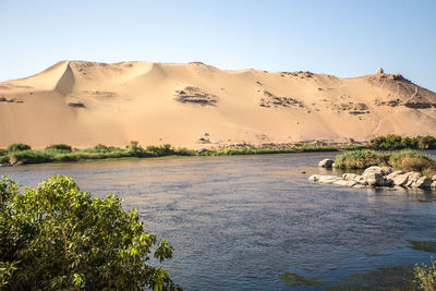 Scenic view of lake against clear sky