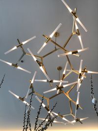 Close-up of airplane flying against sky