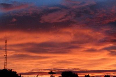 Low angle view of cloudy sky at sunset