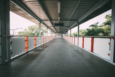 Empty road leading to bridge