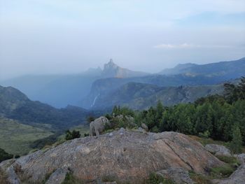 Beautiful scenic view from kodanad view point ooty of misty rain cloud hill mountain green forest