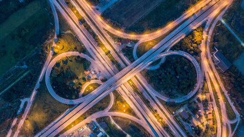 High angle view of light trails on road at night