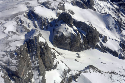 Scenic view of snow covered mountains