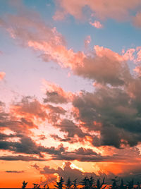 Low angle view of dramatic sky during sunset