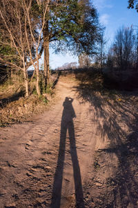 Shadow of man on field