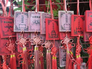 Red prayer cards hanging at shrine