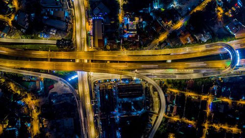 High angle view of light trails on road at night