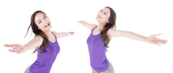 Happy young woman against white background